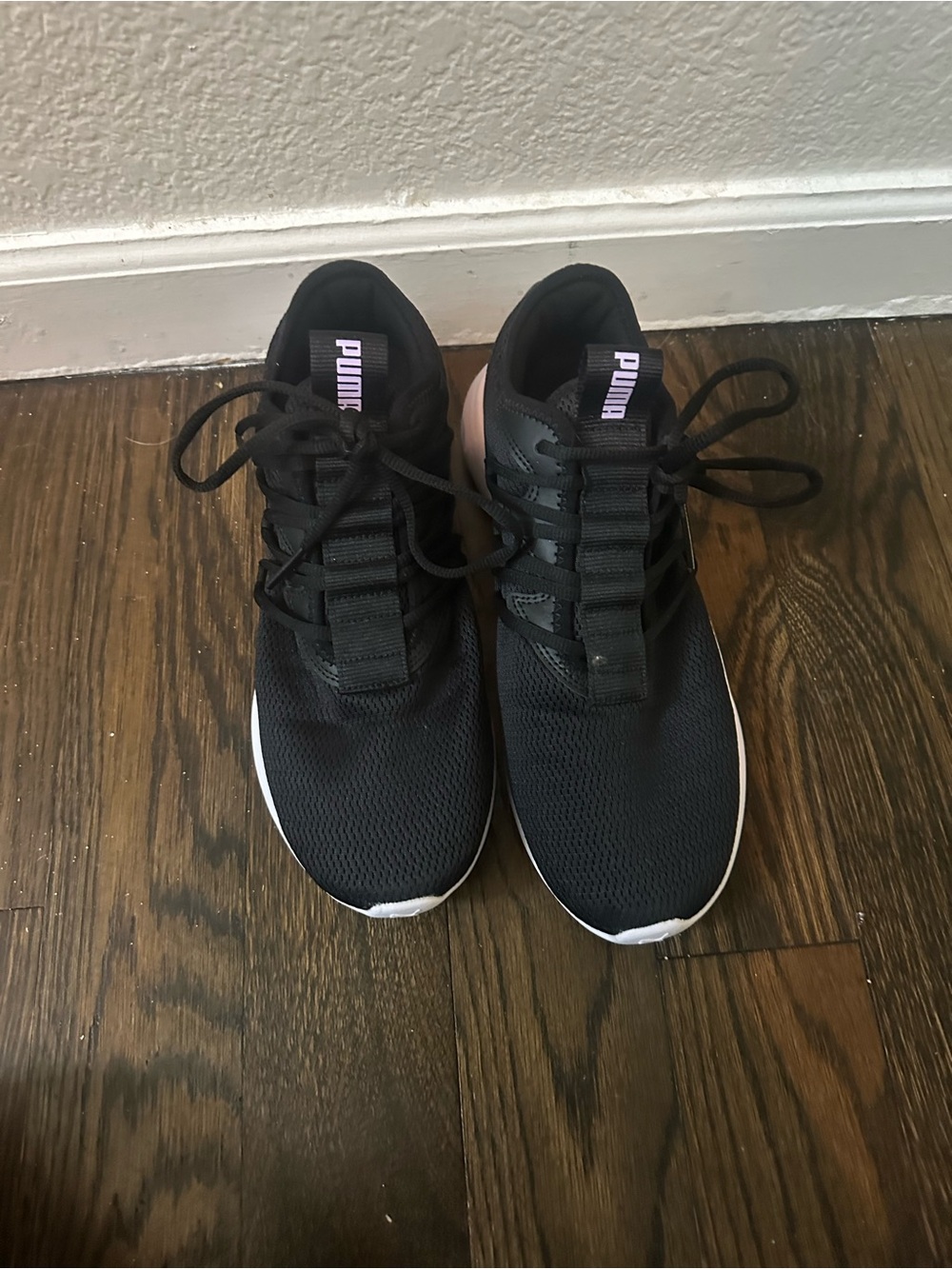 NWOT Puma Black Sneakers with Lavender Logo and White Sole